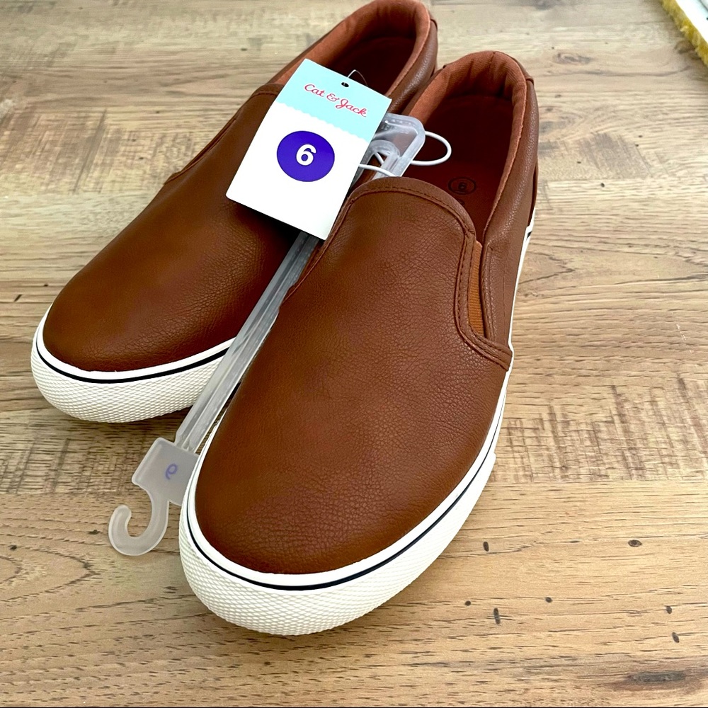 Brown synthetic leather slip inside